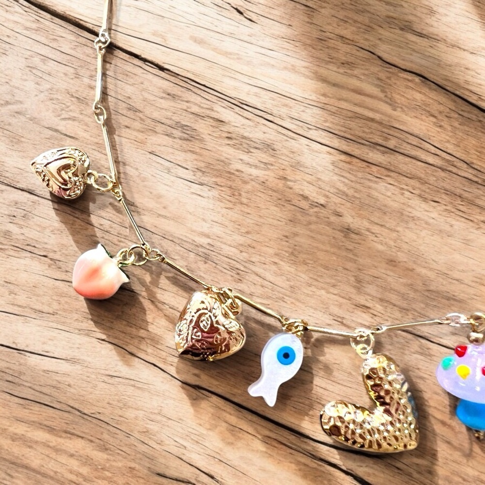 Adorable gold toned summer fun charm necklace. Crab boils here we come! - Picture 7 of 17